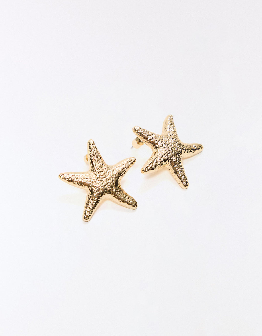 Brincos estrela-do-mar dourados